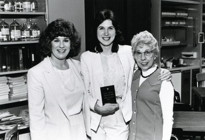 SUNY Niagara Nursing Faculty Cathy Peuquet and Elena Perone presenting an achievement award to student, 1985
